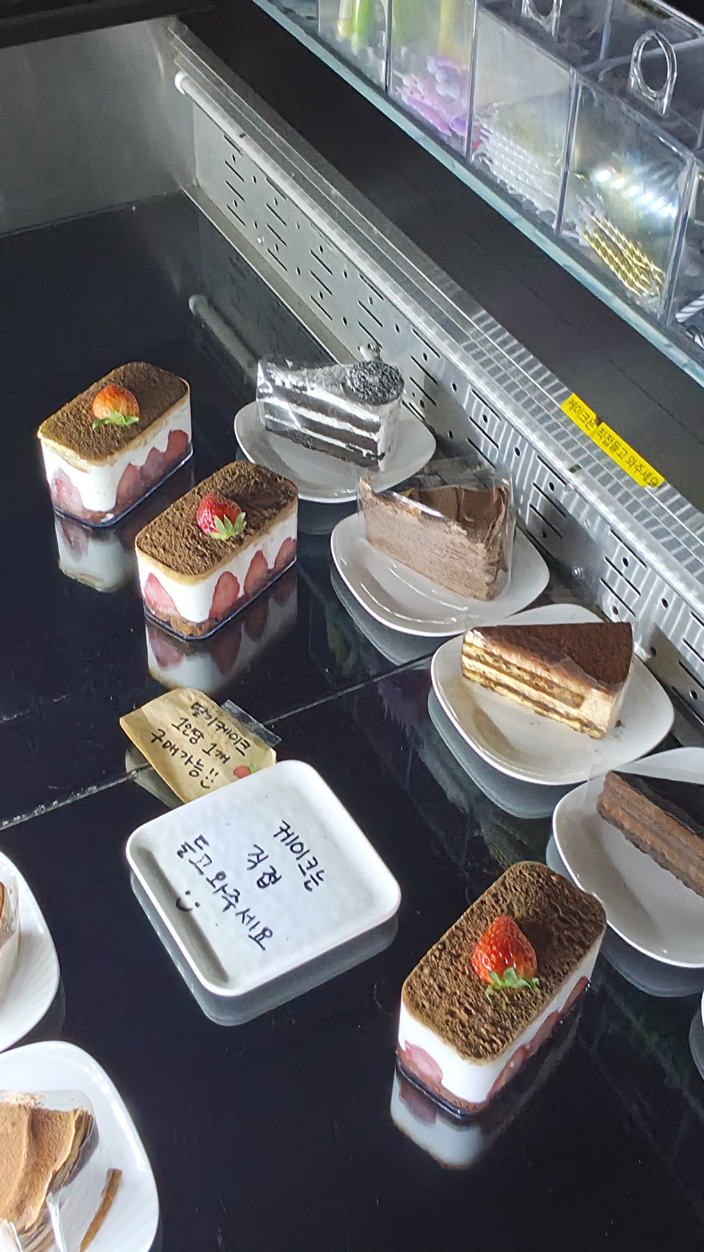 Paldang Log signature strawberry cake display tiramisu chocolate cake